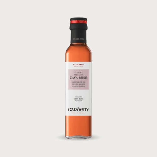 Glazen fles Badia Cava Rosé azijn voor salades en carpaccio.